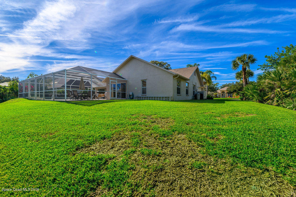 3525 Shady Run Road Melbourne, FL 32934 - Photo 9 of 32 a view of a house with a yard