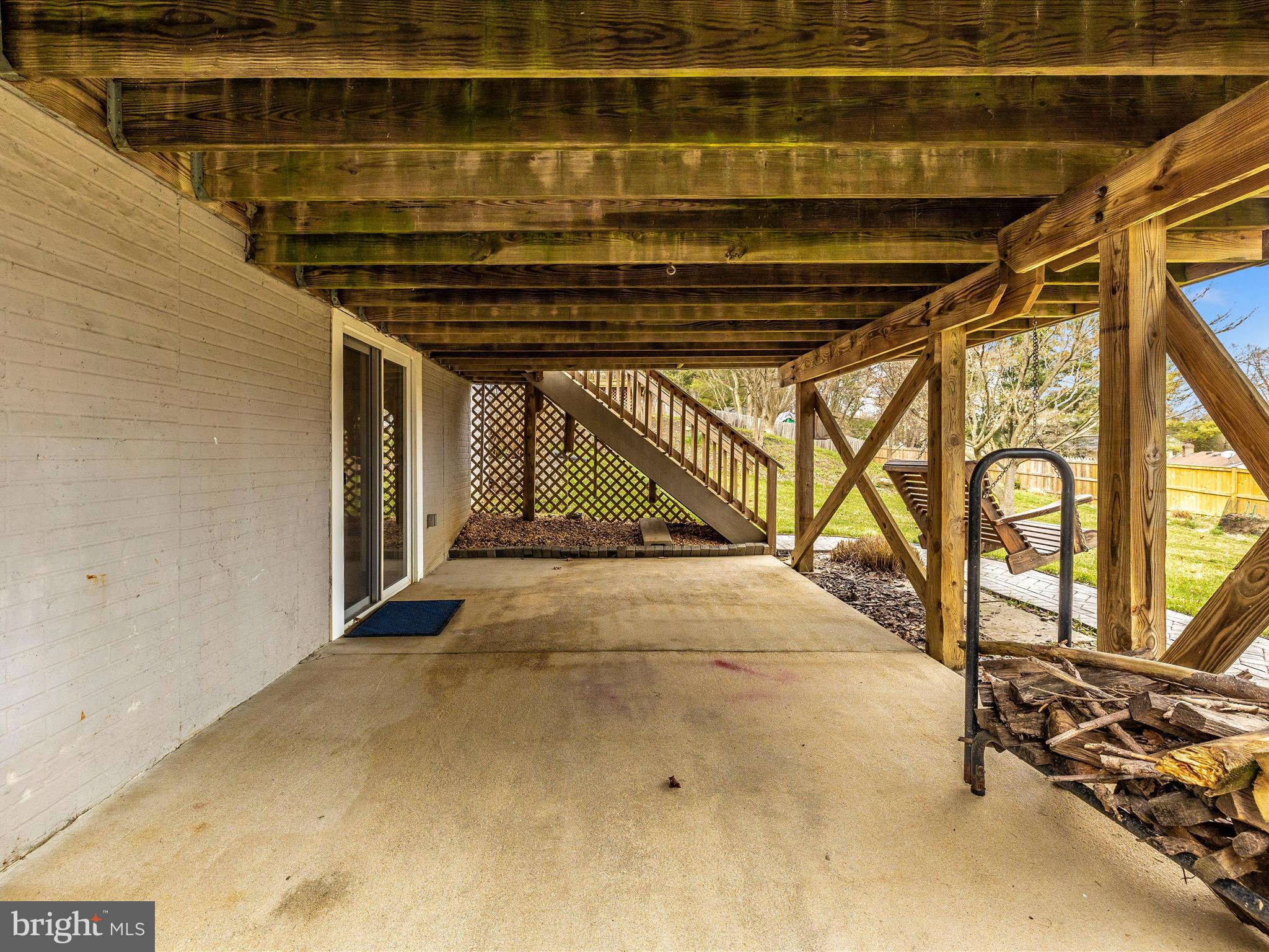 24217 Welsh Road Gaithersburg, MD 20882 - Photo 59 of 65 Patio, porch swing, wood storage, etc.