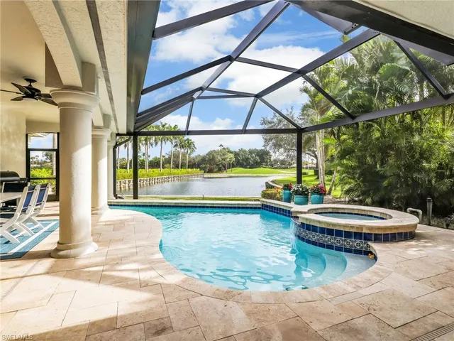 a view of swimming pool with a patio