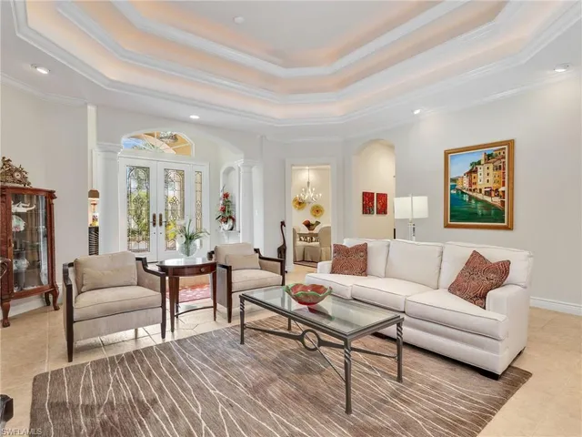 a living room with furniture and a couch