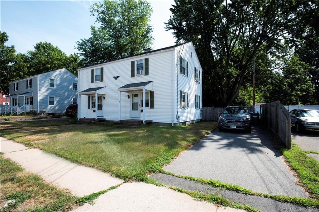 87 Waddell Road Manchester, CT 06040 - Photo 1 of 1 a view of a house with backyard and sitting area