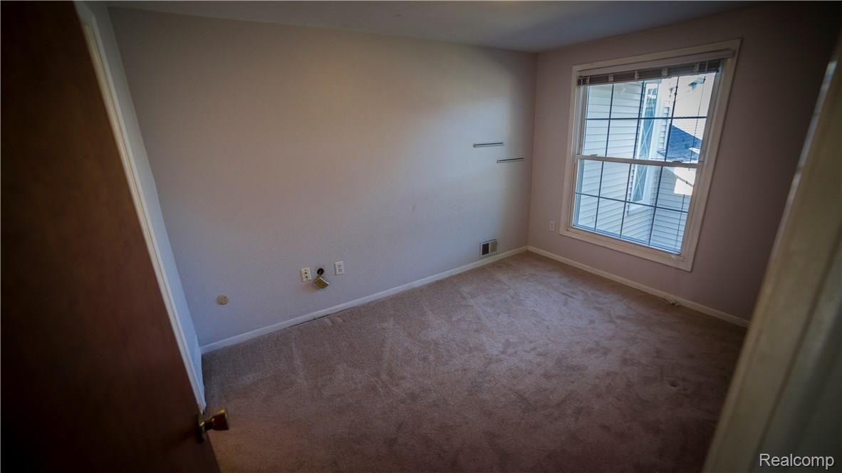 3505 Crooks Road, Unit 6 Royal Oak, MI 48073 - Photo 14 of 17 Crooks bed.jpg