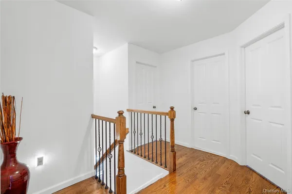 a view of entryway with wooden floor