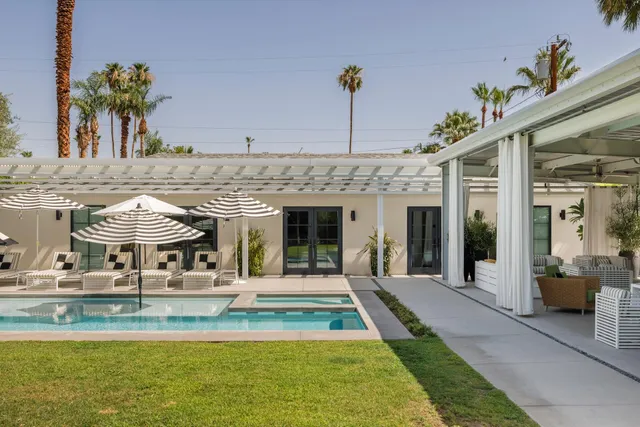 a view of a house with swimming pool