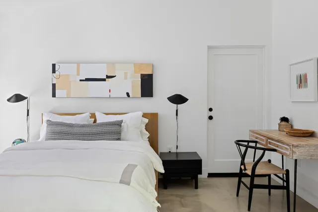 a workspace with furniture and window