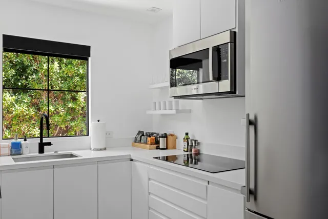 a room with musical instruments and wooden floor
