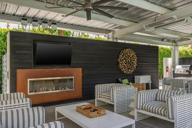 a room with furniture and a fireplace