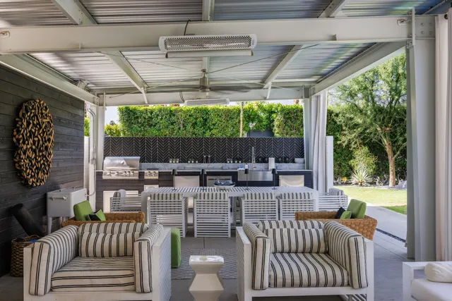 a outdoor living space with patio furniture and a potted plant