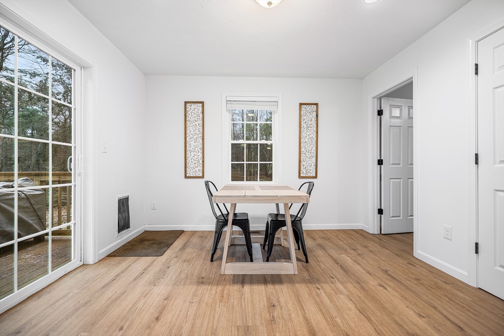 48 Walnut Street Douglas, MA 01516 - Photo 11 of 32 a view of a dining room with furniture and wooden floor