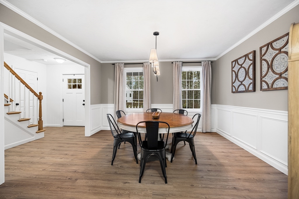 48 Walnut Street Douglas, MA 01516 - Photo 13 of 32 a view of a dining room with furniture window and wooden floor
