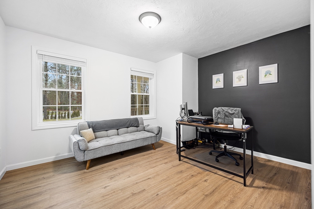 48 Walnut Street Douglas, MA 01516 - Photo 14 of 32 a view of a livingroom with workspace and a window