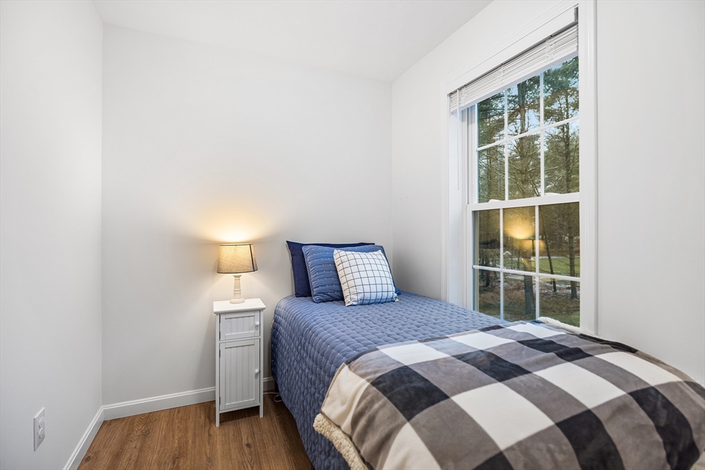 48 Walnut Street Douglas, MA 01516 - Photo 23 of 32 a bedroom with a bed and a window