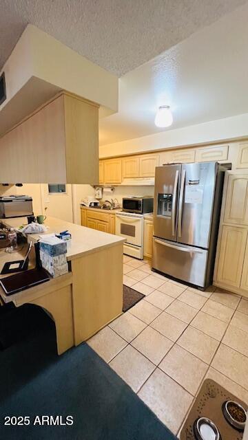 8113 West Osborn Road Phoenix, AZ 85033 - Photo 8 of 35 a kitchen with a sink cabinets and appliances