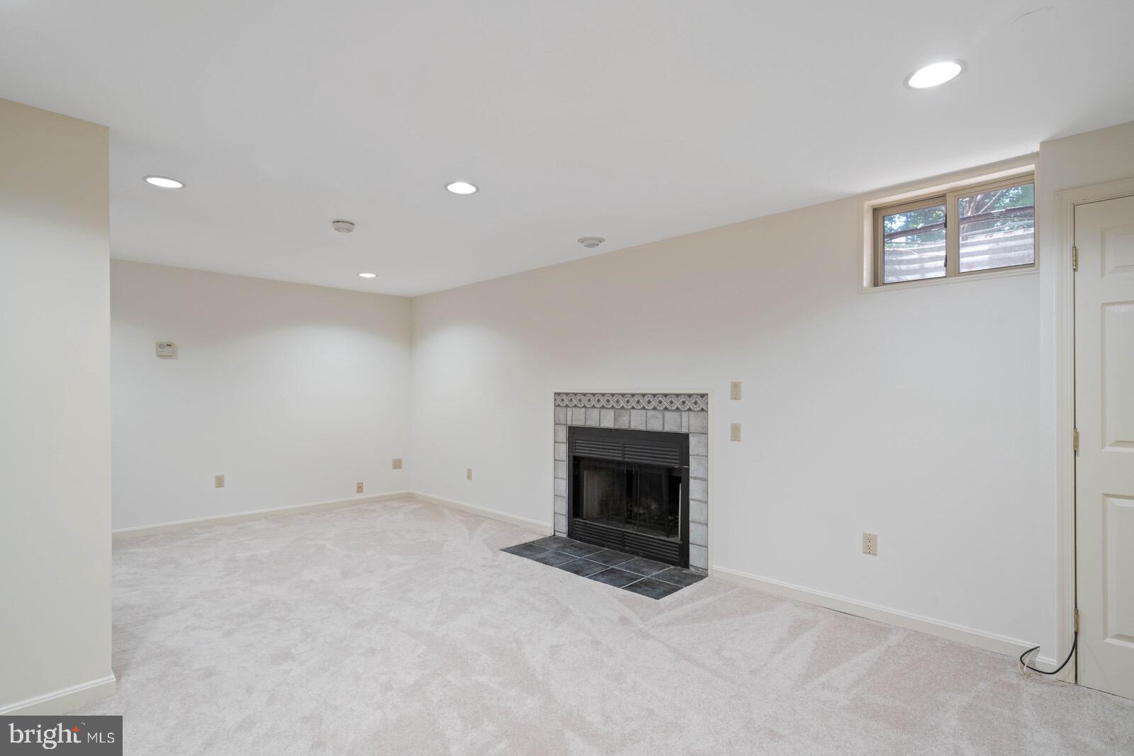 7271 Olde Lantern Way Springfield, VA 22152 - Photo 38 of 44 Finished Lower Level with Fireplace