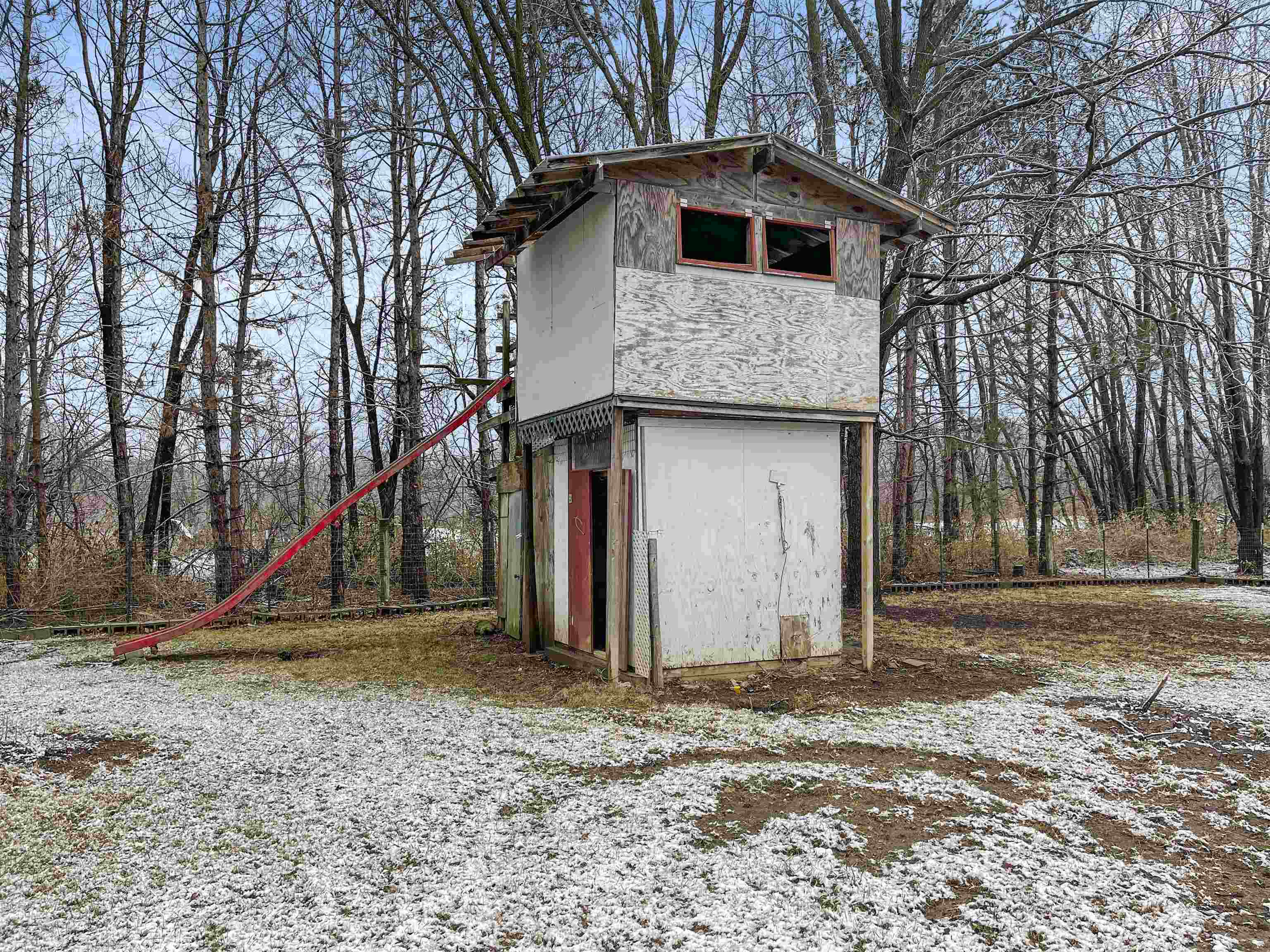 6872 Safford Road Rockford, IL 61101 - Photo 24 of 25 a house view with a yard and a wooden fence