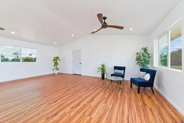 a workspace with furniture and wooden floor