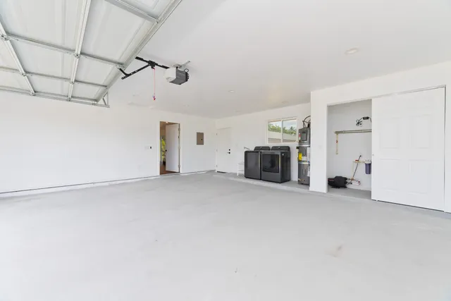 a view of empty room with fireplace