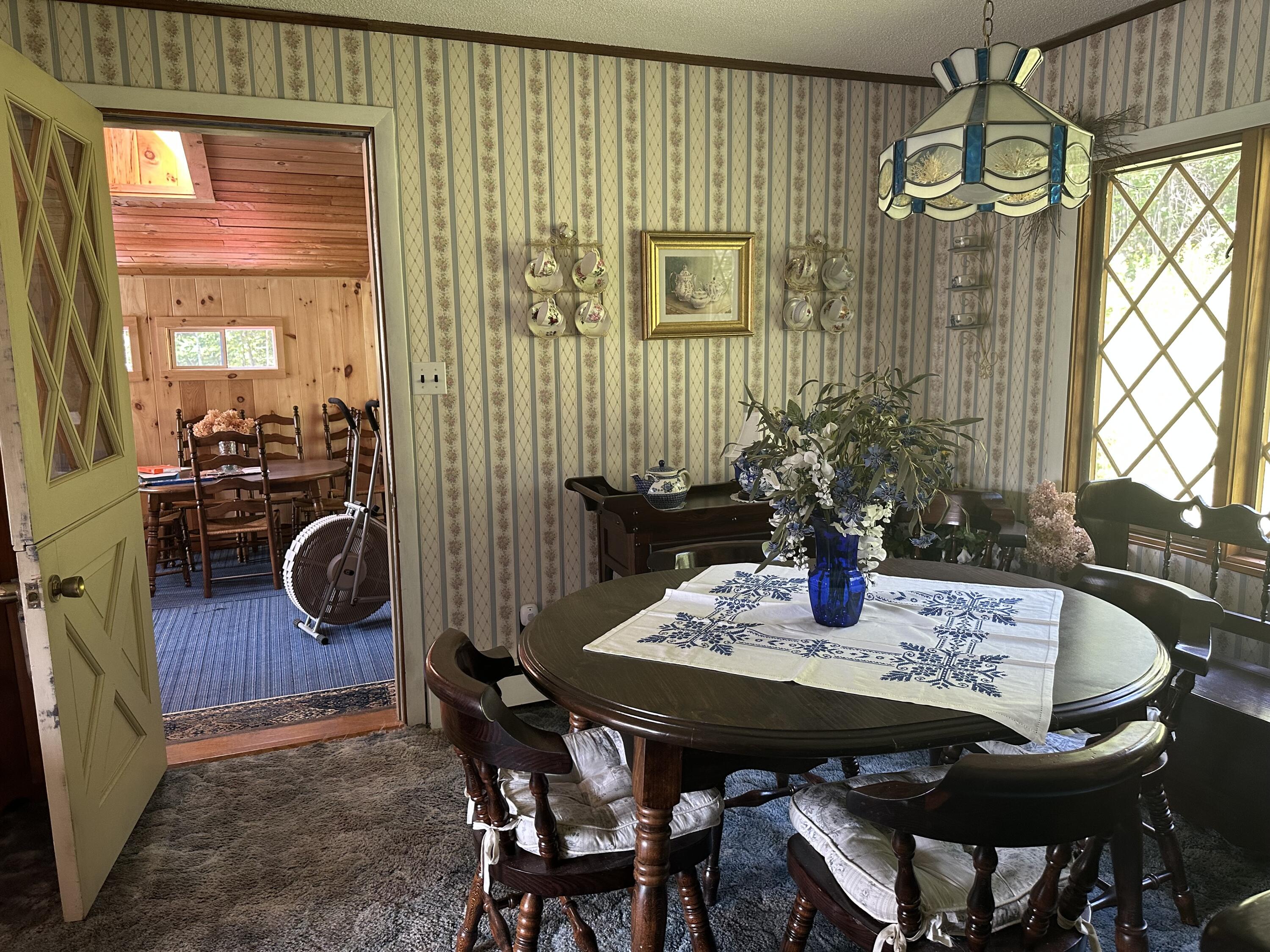 1142 U.S. Rte 2 Rumford, ME 04276 - Photo 11 of 28 1142 dining room to den