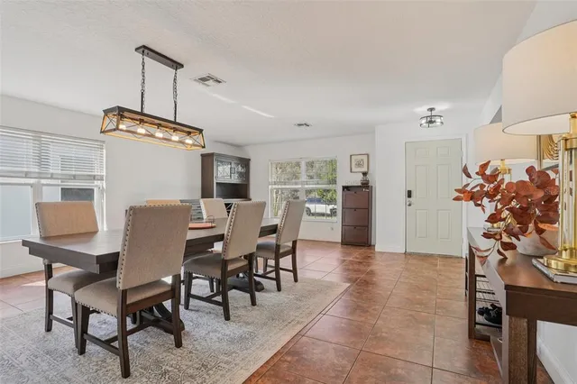a view of a dining room with furniture