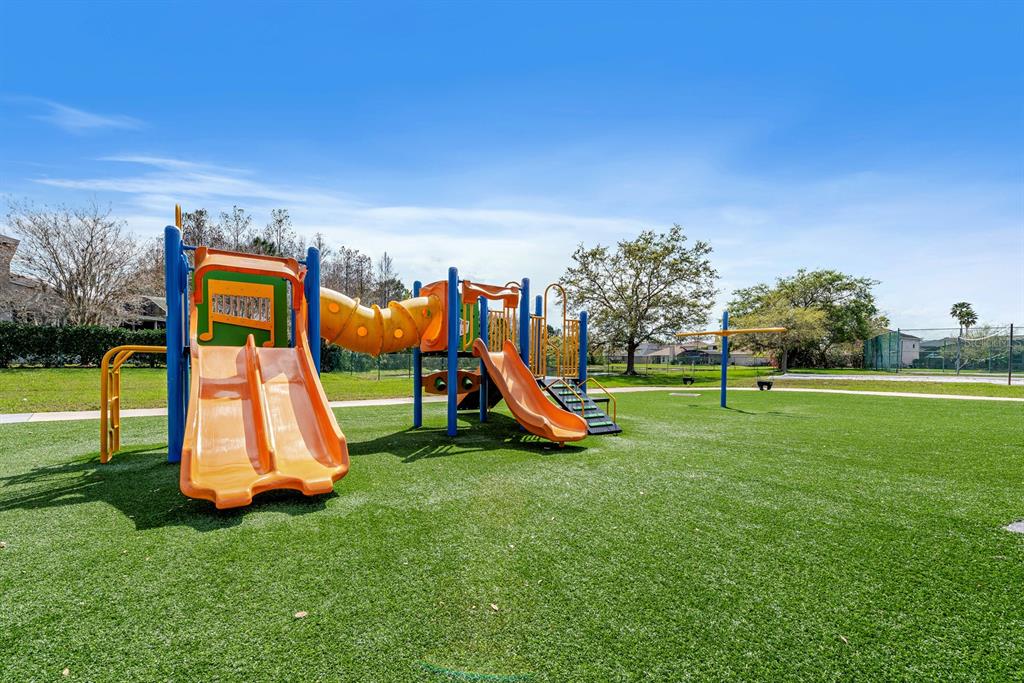 739 Sterling Spring Road Orlando, FL 32828 - Photo 28 of 30 a view of a park with swings
