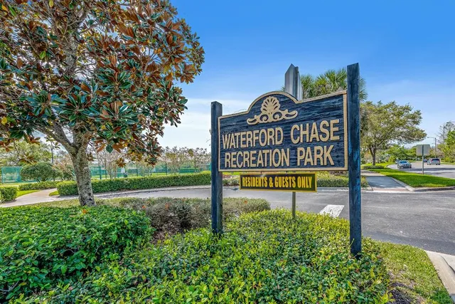 a sign board with a yard