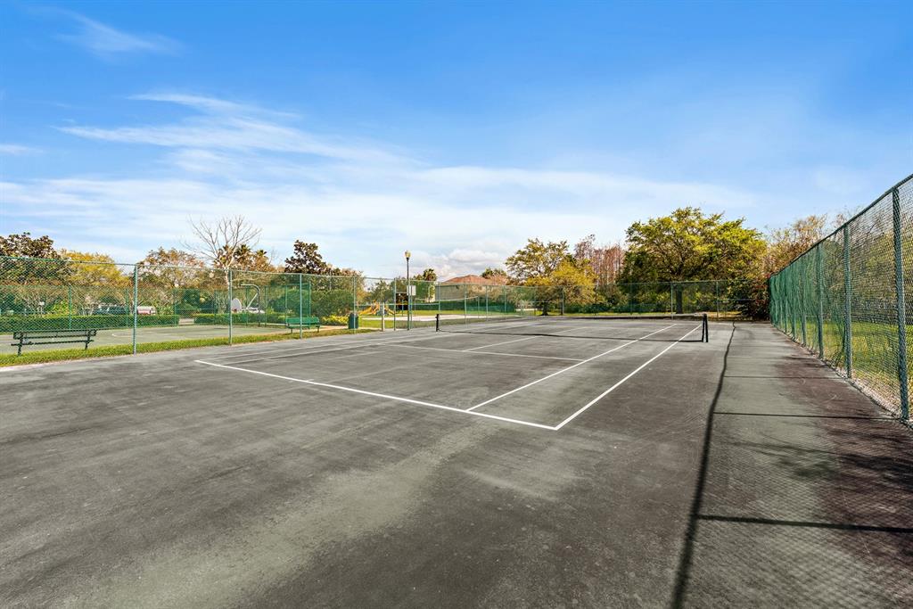 739 Sterling Spring Road Orlando, FL 32828 - Photo 30 of 30 a view of a tennis court