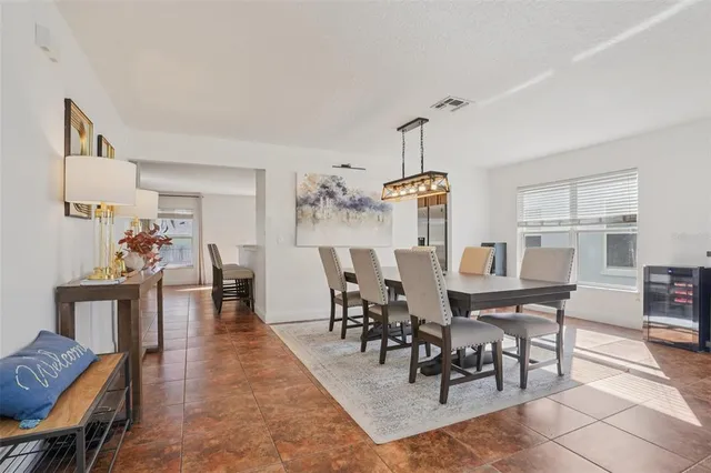 a view of a dining room with furniture