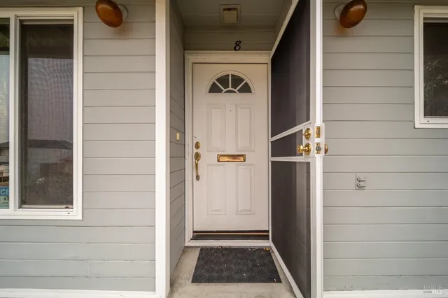 a view of front door and porch