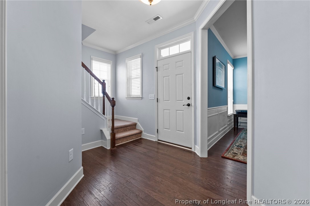 141 Pine Hawk Drive Spring Lake, NC 28390 - Photo 5 of 21 a view of an entryway with wooden floor