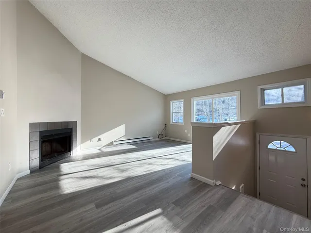 a view of livingroom and hardwood floor