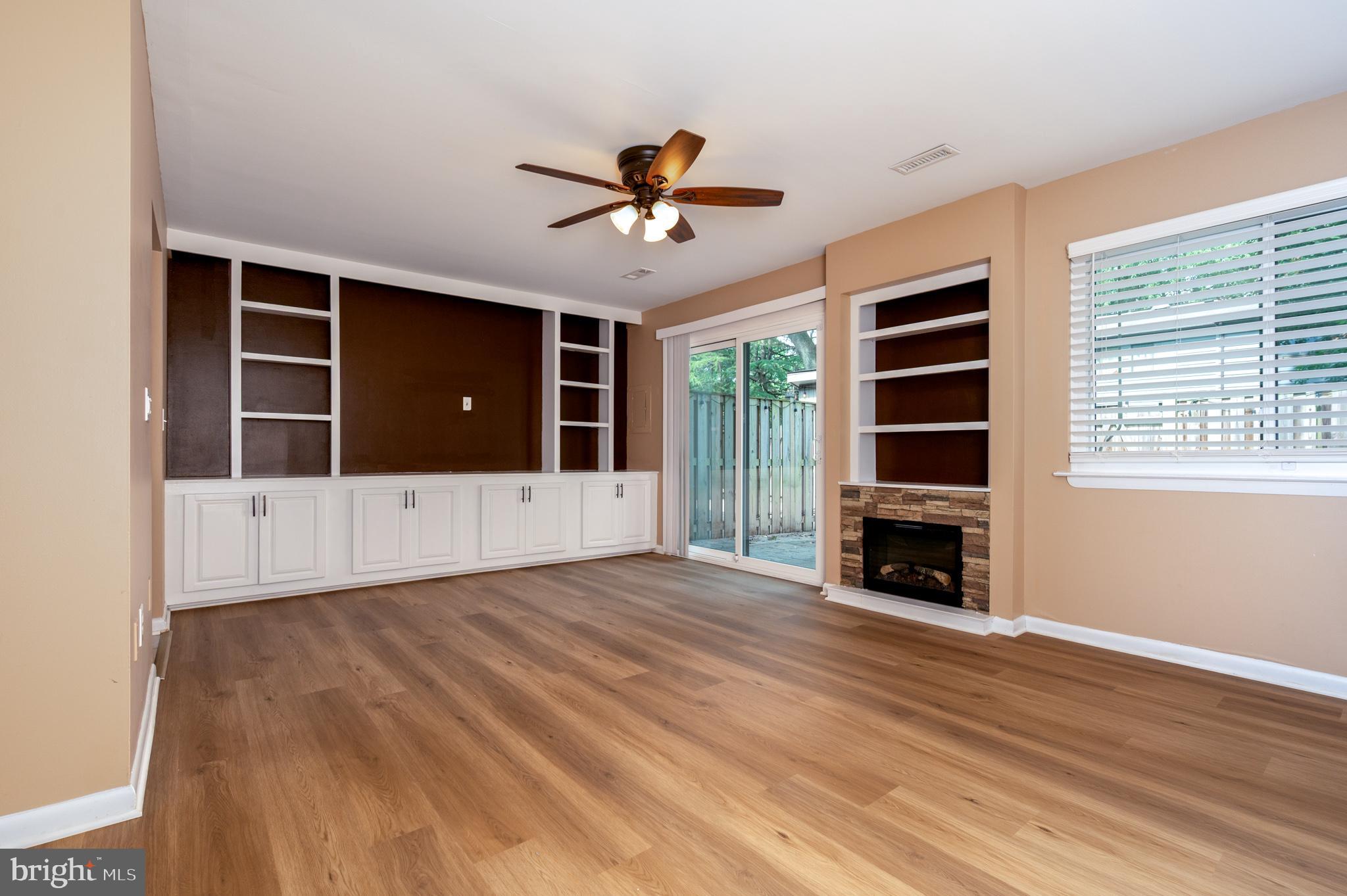 1008 Cedar Ridge Court Annapolis, MD 21403 - Photo 10 of 32 Family room w/ cozy stone fireplace