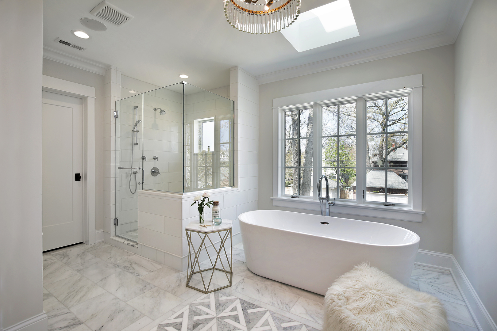 1151 Seneca Road Wilmette, IL 60091 - Photo 35 of 39 a spacious bathroom with a tub sink shower and mirror