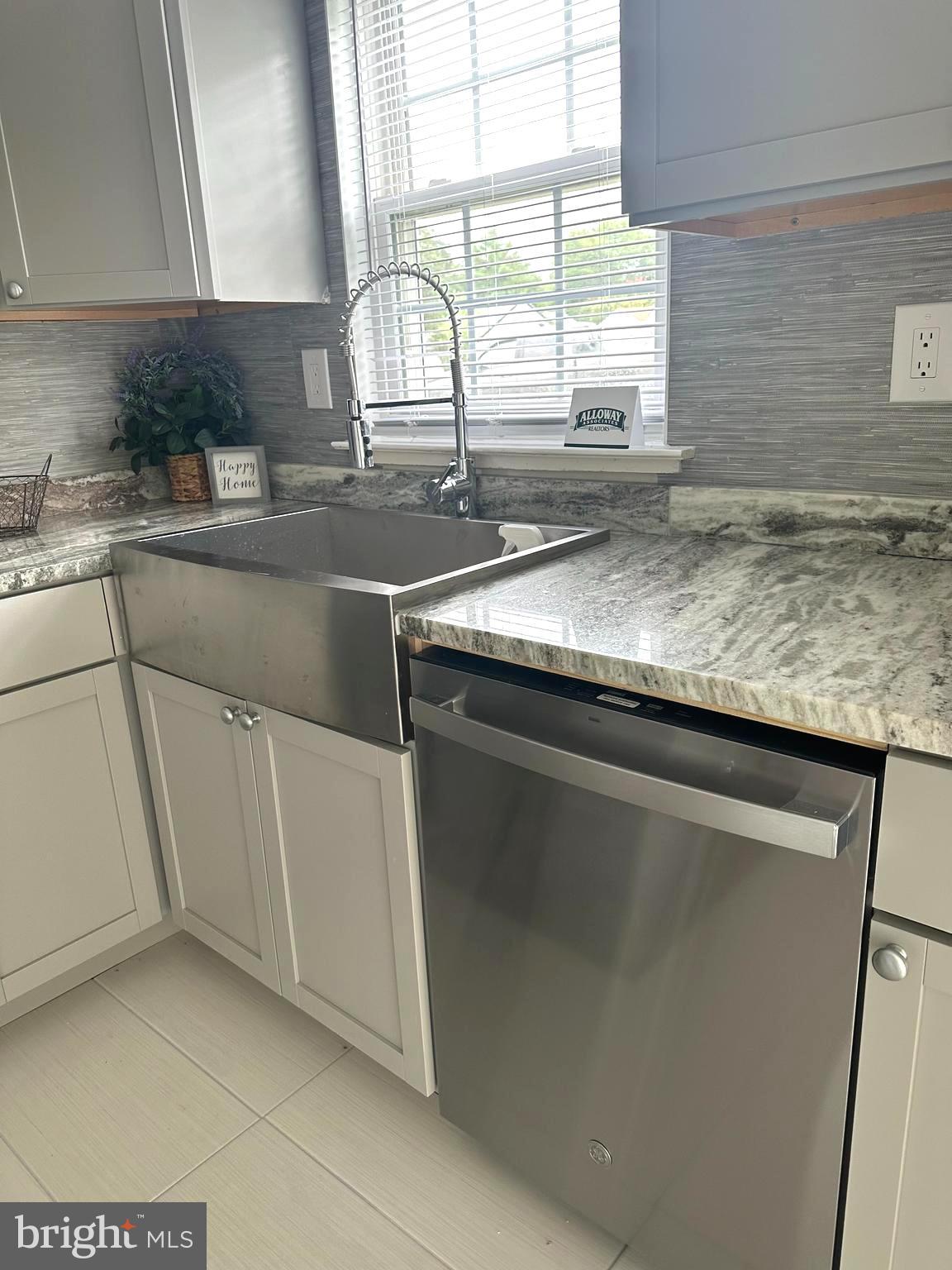 14 Narberth Place Southampton, NJ 08088 - Photo 17 of 33 a kitchen with granite countertop a sink and a window