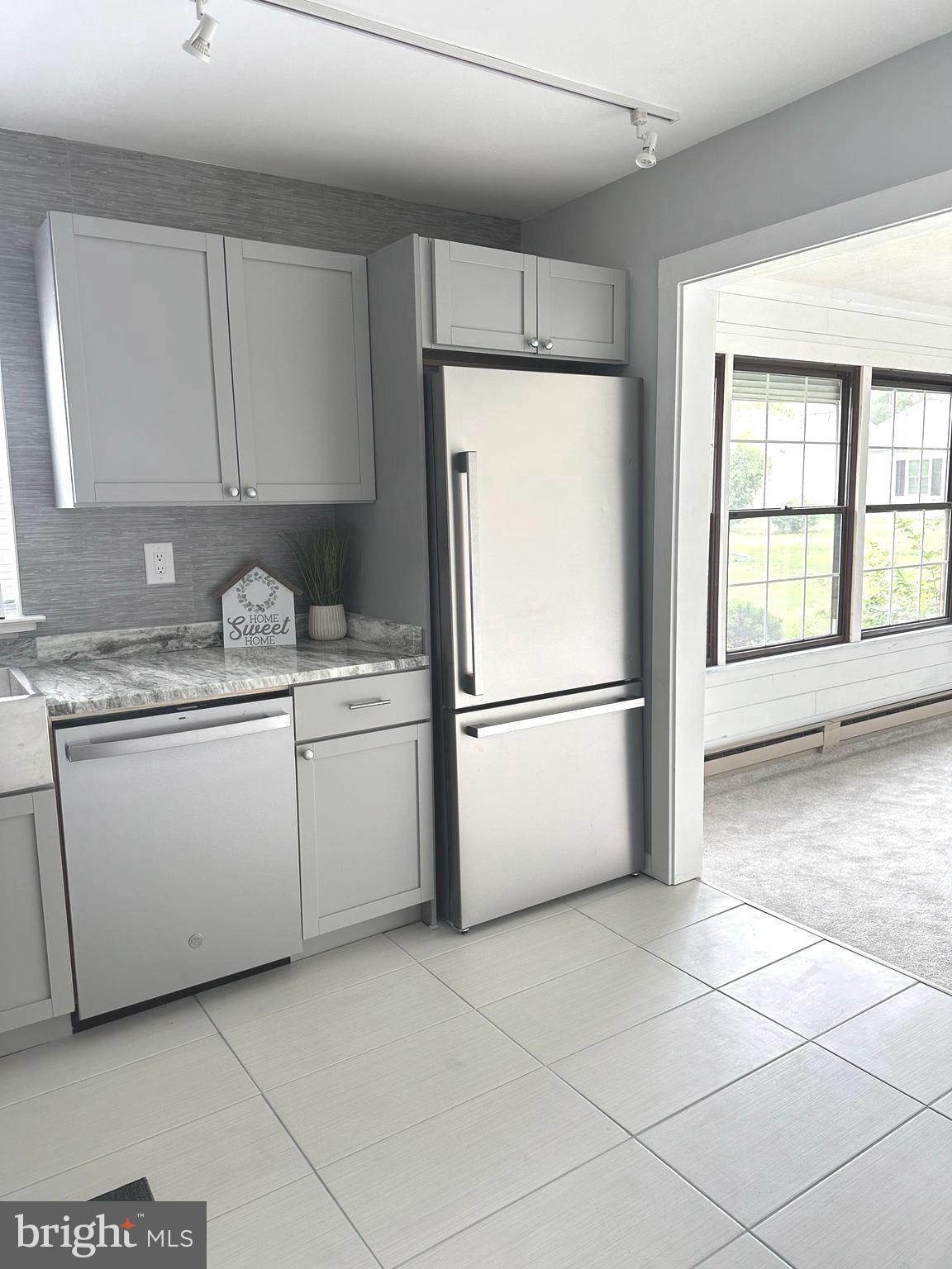 14 Narberth Place Southampton, NJ 08088 - Photo 19 of 33 a kitchen with a refrigerator sink and cabinets