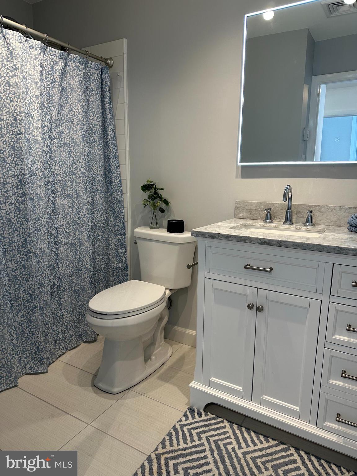 14 Narberth Place Southampton, NJ 08088 - Photo 21 of 33 a bathroom with a toilet a sink and shower