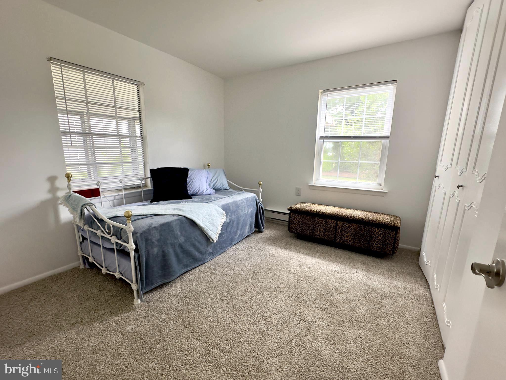 14 Narberth Place Southampton, NJ 08088 - Photo 24 of 33 a bedroom with a bed a couch and a window