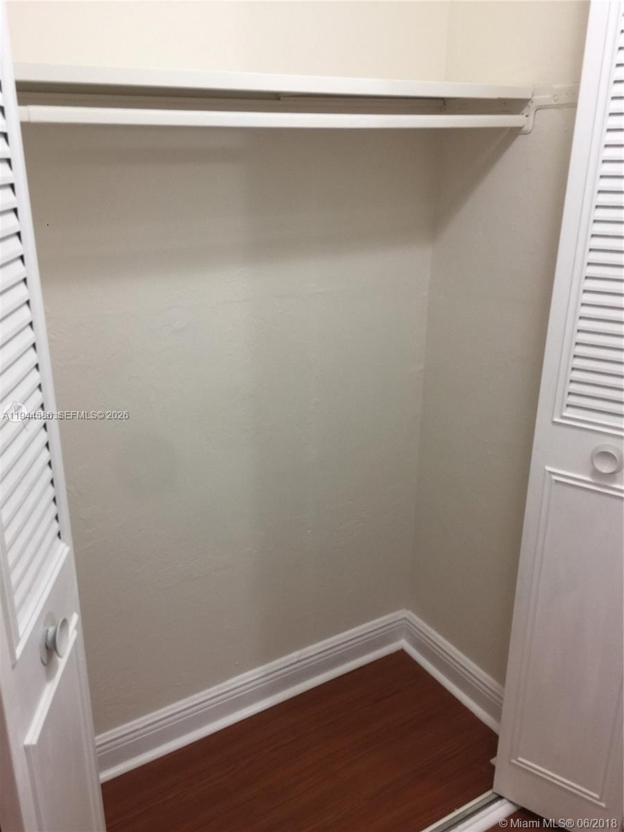 9403 Southwest 76th Street, Unit Y28 Miami, FL 33173 - Photo 12 of 20 a close up view of racks on the wall