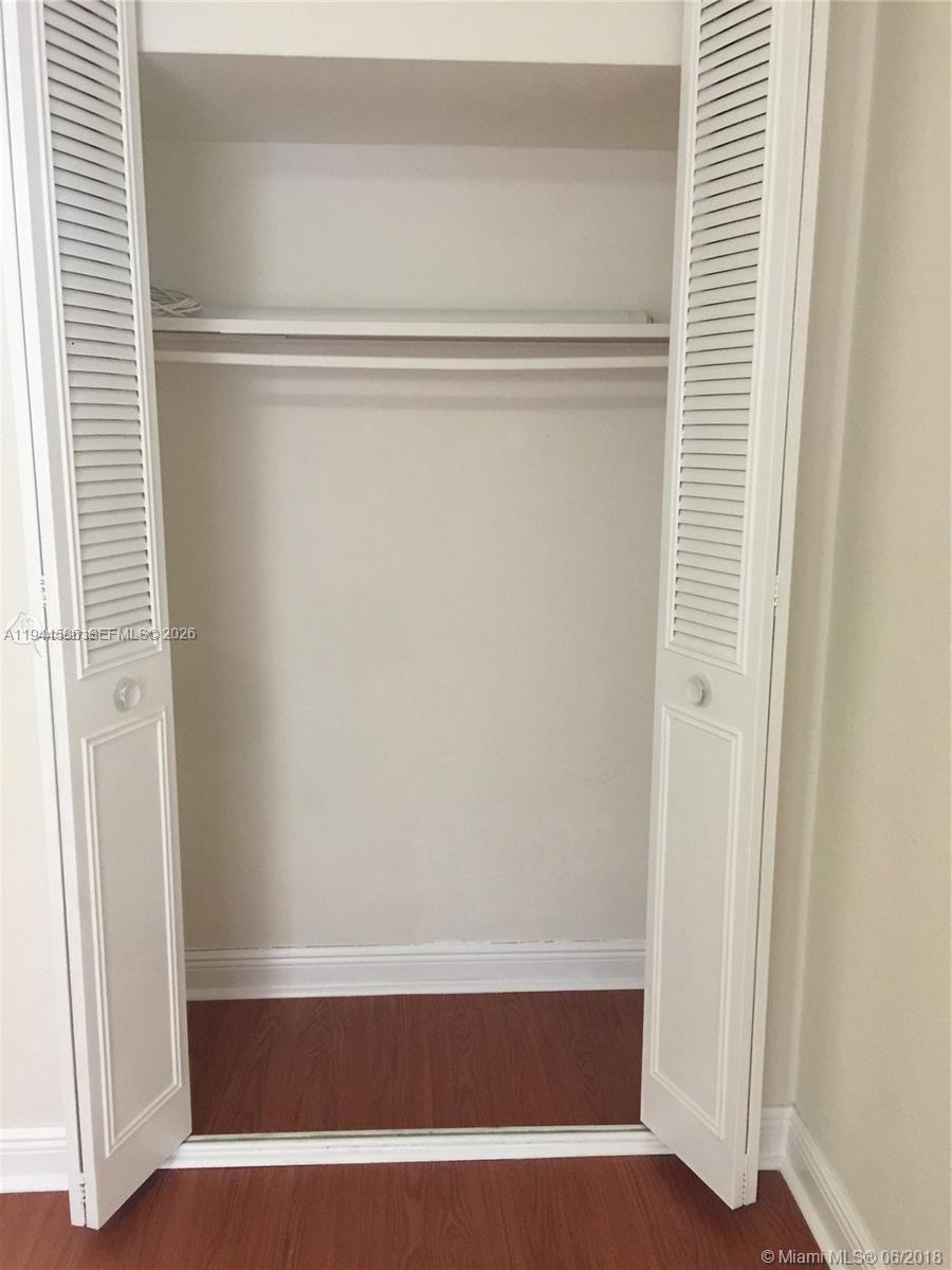 9403 Southwest 76th Street, Unit Y28 Miami, FL 33173 - Photo 13 of 20 a view of closet