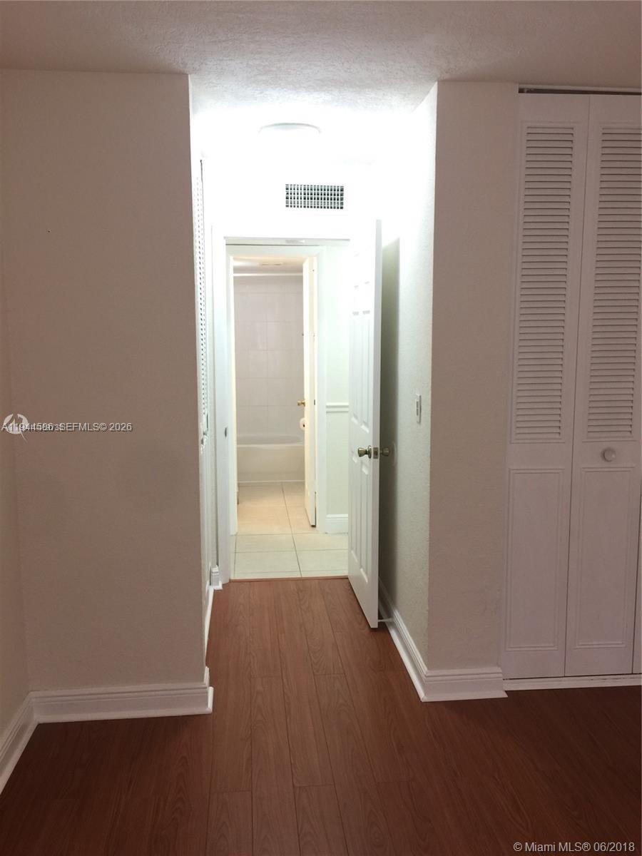 9403 Southwest 76th Street, Unit Y28 Miami, FL 33173 - Photo 14 of 20 a view of an empty room