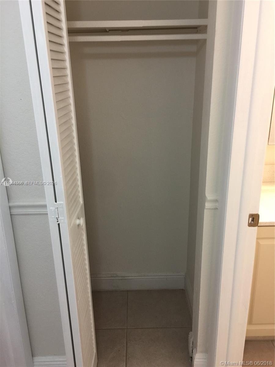 9403 Southwest 76th Street, Unit Y28 Miami, FL 33173 - Photo 9 of 20 a view of closet