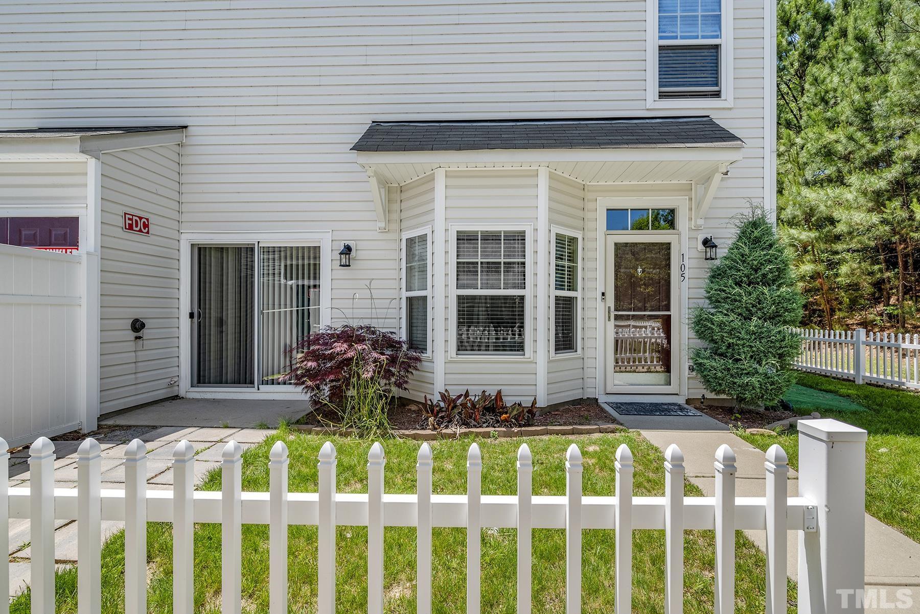 a front view of a house with a porch