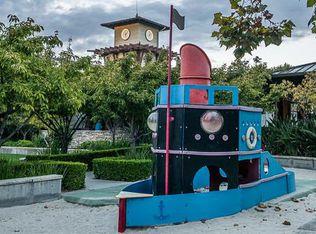 190 Rainbow Place Milpitas, CA 95035 - Photo 17 of 18 a front view of a house with garden and trees