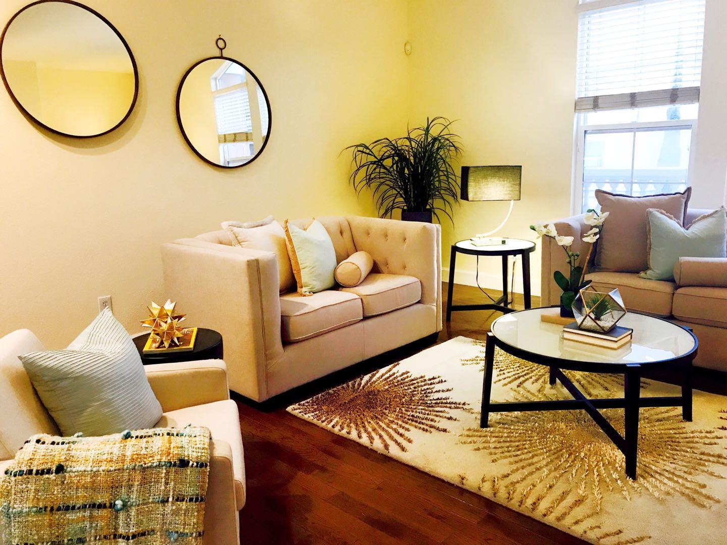 190 Rainbow Place Milpitas, CA 95035 - Photo 2 of 18 a living room with furniture and a large window