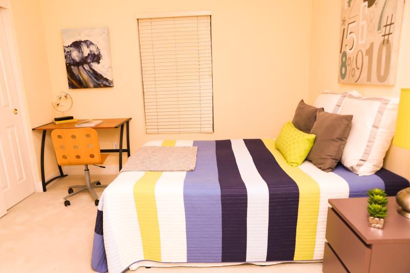 190 Rainbow Place Milpitas, CA 95035 - Photo 8 of 18 a bedroom with a bed and a couch