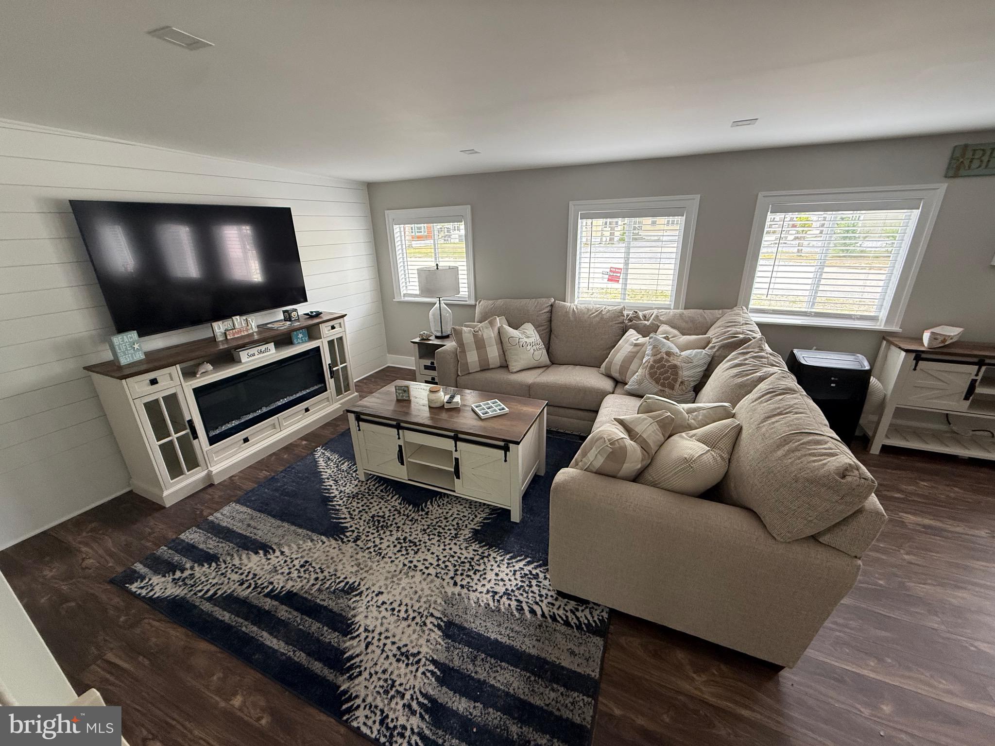 515 Corsons Tavern Road, Unit H27 Ocean View, NJ 08230 - Photo 4 of 20 family room w/ fireplace