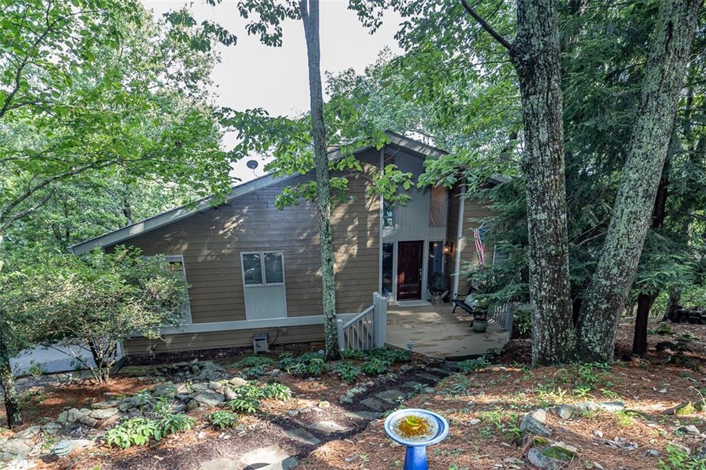 245 Ridgeview Drive Big Canoe, GA 30143 - Photo 1 of 1 a house view with a backyard space
