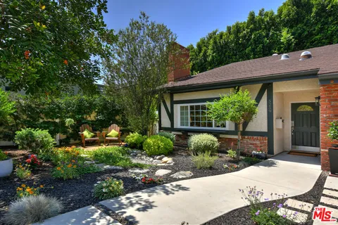 a view of house with outdoor space