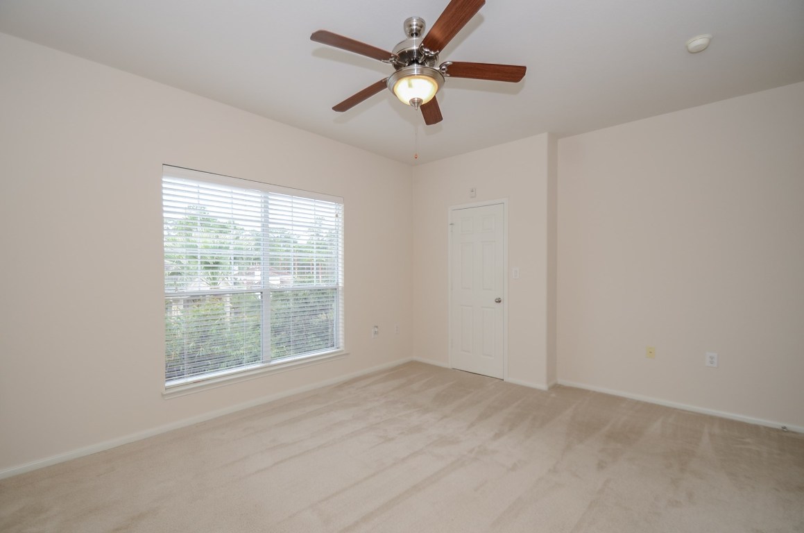 9200 Westheimer Road, Unit 802 Houston, TX 77063 - Photo 21 of 32 a view of an empty room with a window