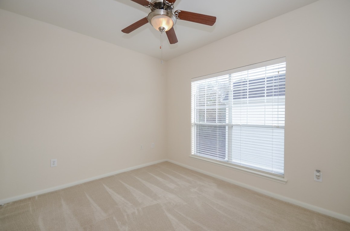 9200 Westheimer Road, Unit 802 Houston, TX 77063 - Photo 5 of 32 a view of an empty room with a window
