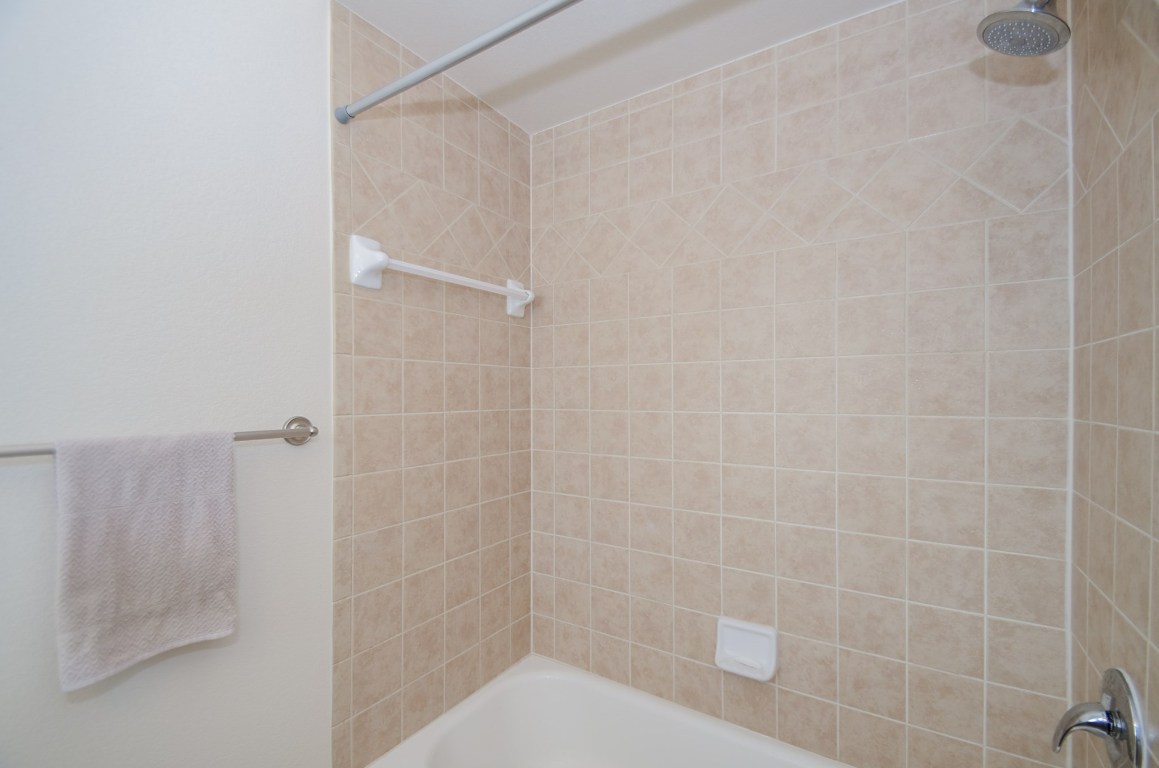 9200 Westheimer Road, Unit 802 Houston, TX 77063 - Photo 10 of 32 a bathroom with a shower